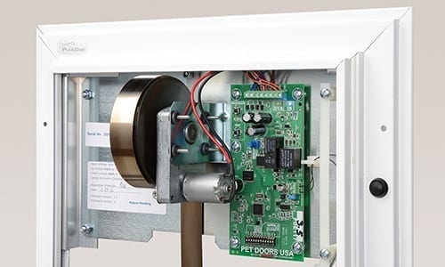 PlexiDor Electronic circuit board and spring